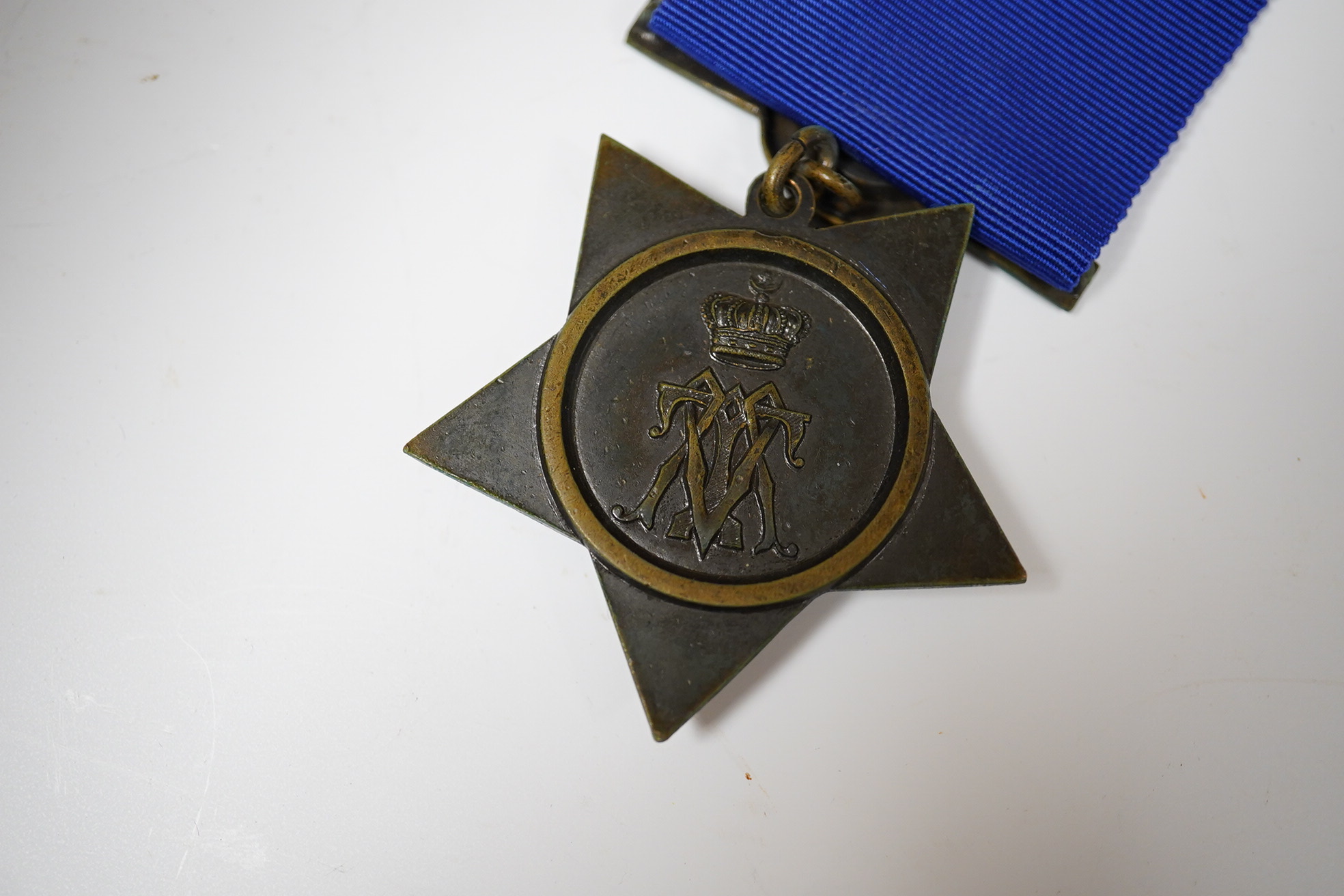 An Egypt Medal 1882-89 with Abu Klea clasp to Corpl H.Bennett 4th Coy. 2nd Batt. Gren. Gds. and a replica Khedive's Star 1882.